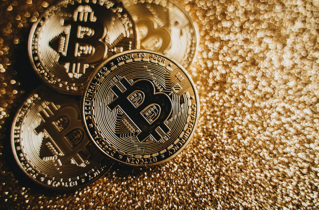 How do investment banks and regulators view cryptocurrencies?